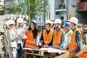 apprentice tradies on a construction site learning from a training provider