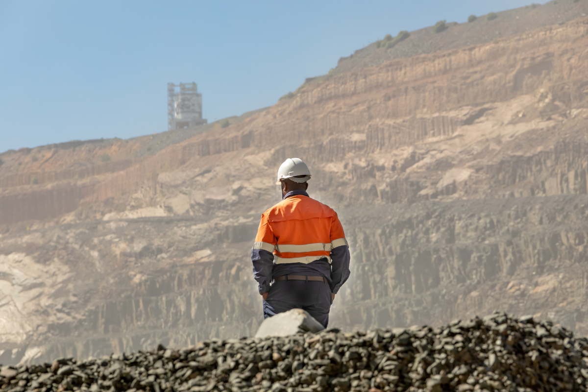 labourer in high vis on a mine site in Australia