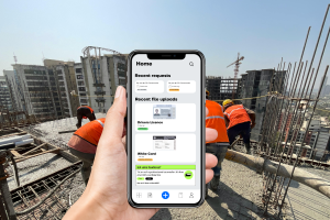 tradies on a construction site with a hand holding a phone viewing the tradie pass app