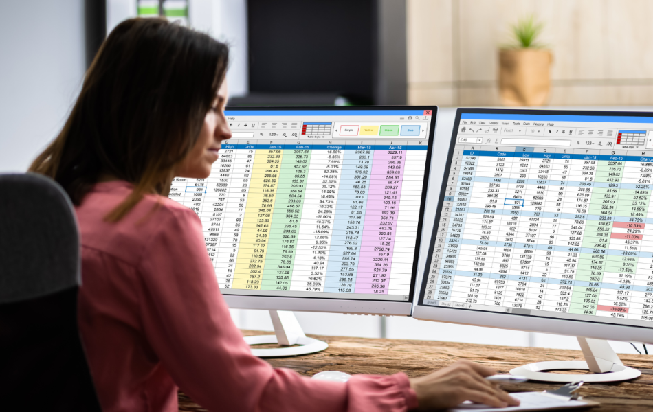 construction administrator looking at a spreadsheet