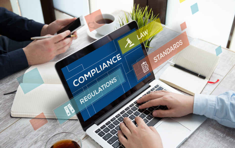 construction business admins sitting at a laptop sorting their crews compliance documents